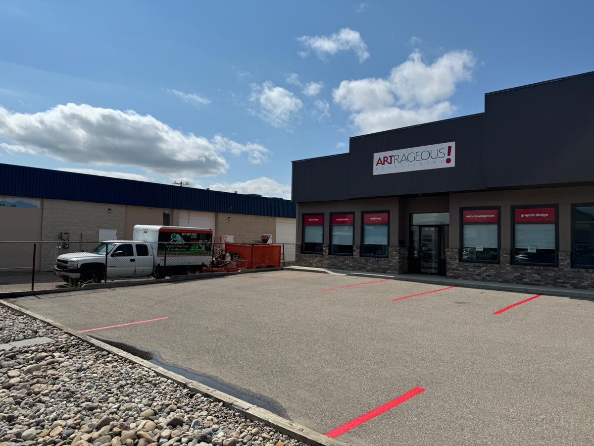 Commercial parking lot after asphalt crack sealing and surface maintenance